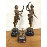 A pair of late nineteenth century French bronzed spelter figurines with draped dancing ladies on