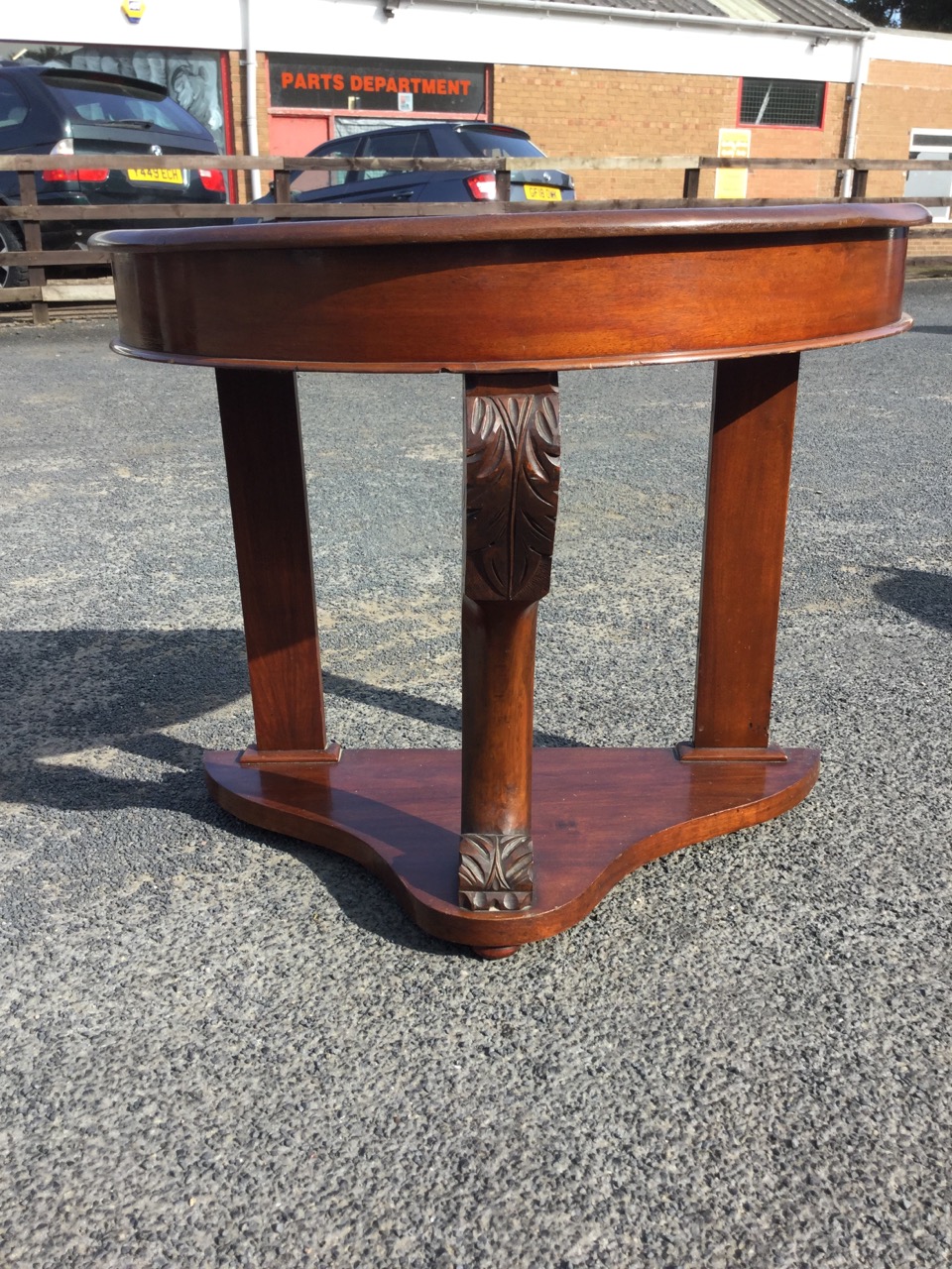 A Victorian mahogany hall table of D shaped outline, having plain frieze supported on acanthus - Image 2 of 3