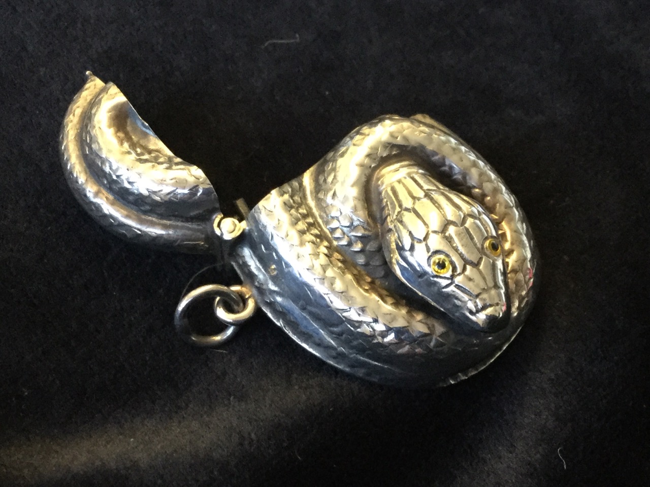 A Sterling silver novelty vesta case modelled as a coiled snake with inlaid eyes, having sprung - Image 2 of 3