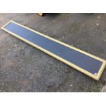 An 8ft long rectangular hanging blackboard sign, chalkable to both sides, in moulded gilt frame. (