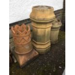 Three Victorian chimney pots - tall octagonal stoneware with moulded plinth & rim tubular on