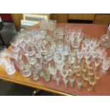 A quantity of drinking glasses including many sets, wine glasses, tankards, cut glass, Stuart