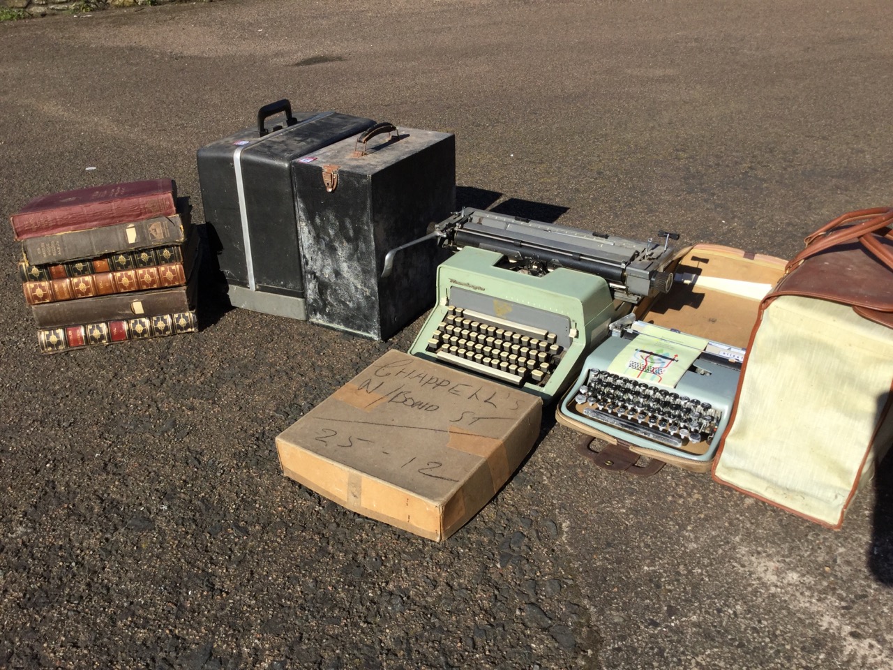 A collection of 78 records - mainly cased classical sets; a Bell & Howell cased film projector;