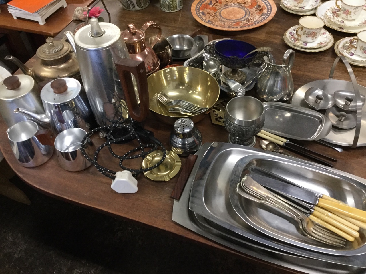 Miscellaneous silver plate, pewter, brass, stainless, copper, etc., including a ribbed three-piece