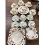 A 60s Swedish six-piece stylised floral coffee set; a Woods Burslem six-piece dessert set of