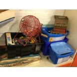 Four boxes of Lego; a bingo cage on stand with cranked handle and coloured numbered balls; a 60s