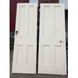 A Victorian painted four panel door, the rimlock with brass knob handles and escutcheon; and another