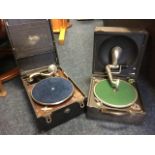 A Maxitone portable cased wind-up gramophone with diaphragm, crank handle, etc; and another