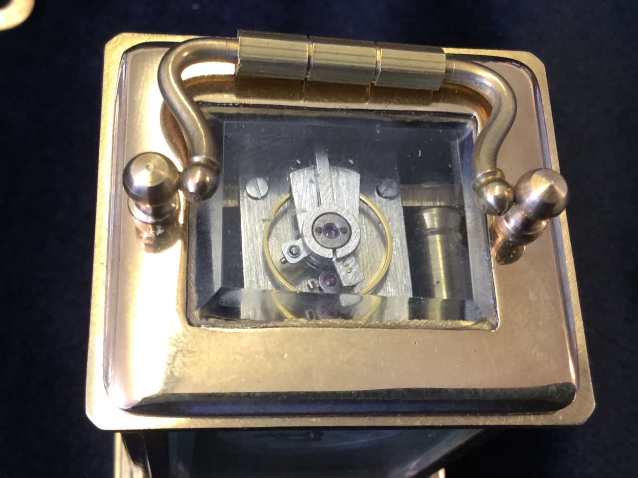 A miniature brass carriage clock mounted with Sevres style panels decorated with cherubs, the - Image 2 of 3