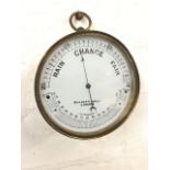 A Victorian brass cased hanging weather barometer by Elliott Bros of The Strand, London having
