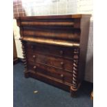 A Victorian mahogany Scotch chest of breakfront outline having two cushion moulded frieze drawers