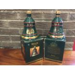 A pair of boxed commemorative Bells whisky bottles, 1992 & 1994 - one with some tipple left. (2)