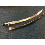 A nineteenth century Indian Talwar sword & scabbard, the polished curved steel blade with hand