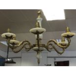 An alabaster & brass chandelier with six acanthus cast scrolled branches holding candlelights with