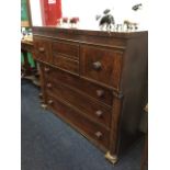 A Victorian mahogany chest with two small drawers to centre flanked by larger crossbanded drawers,