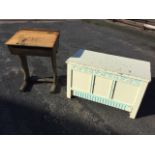 An oak school desk with lifting lid on shaped supports; and a painted blanket box with three