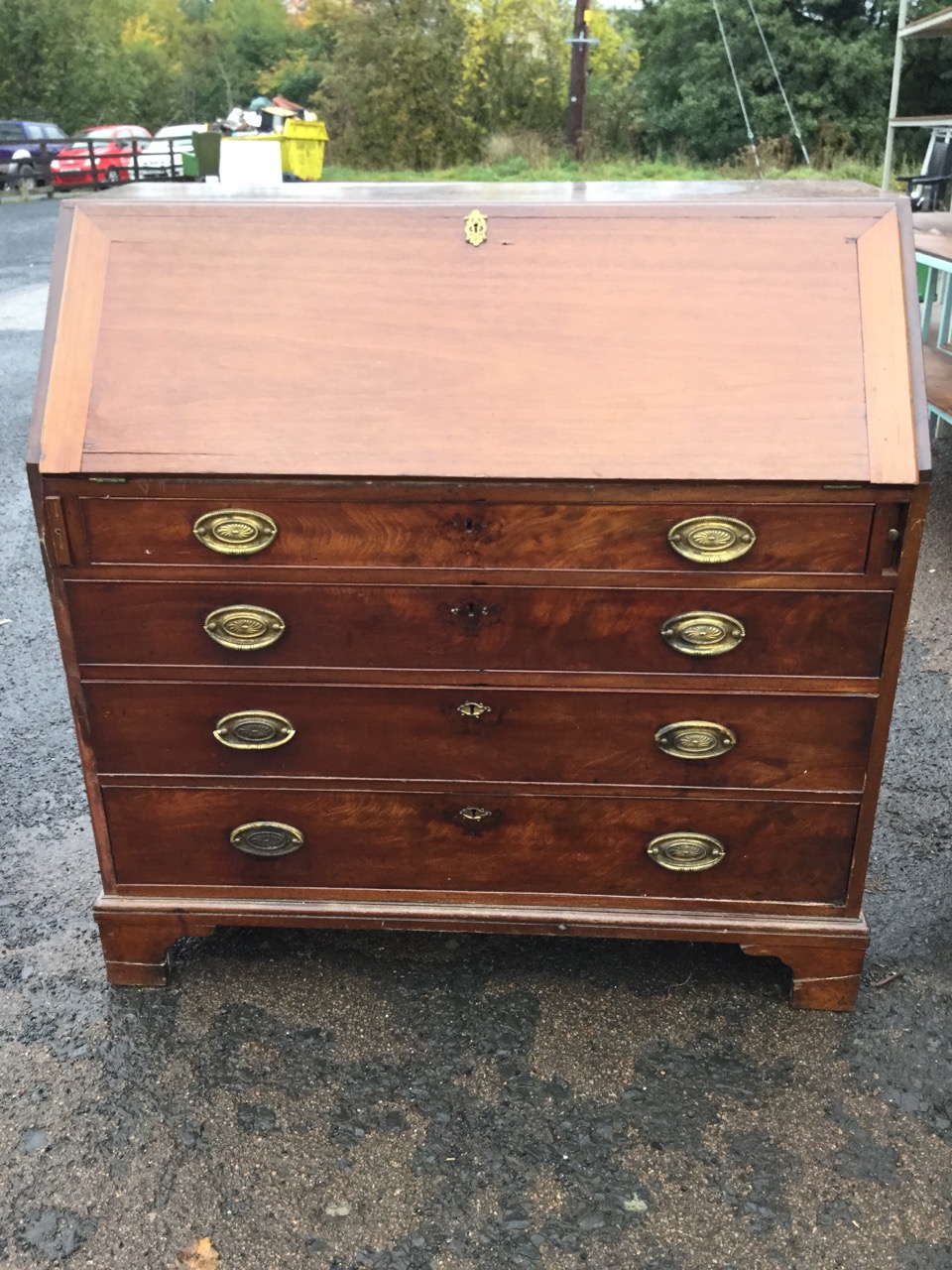 A George III mahogany bureau, the cleated fallfront enclosing a fitted interior with eight small - Image 2 of 3
