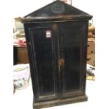 A late Victorian Army & Navy oak tool cabinet, the case with triangular pediment mounted with