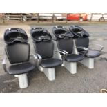 A suite of four hairdresser armchairs with aluminium framed upholstered seats mounted with kidney