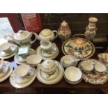 Miscellaneous oriental ceramics including a porcelain teaset, vases, tea bowls, wall plates,
