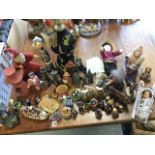 A collection of figures including sets of Indians, carved wood & stone, resin moulded, boxes, a