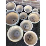 Three pairs of glazed graduated stoneware garden pots; and four larger others with miscellaneous