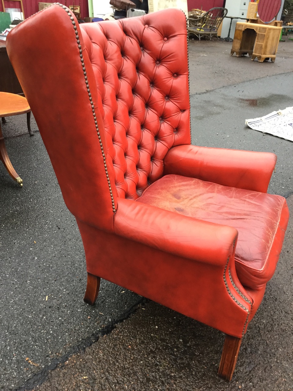 A Georgian style leather button upholstered wingback armchair, with brass studding and loose - Image 3 of 3