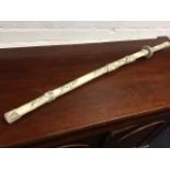 A Japanese carved bone/ivory case, well glued up forming an okimono with engraved cloud & floral