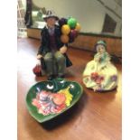 A Royal Doulton The Balloon Man figurine - HN 1954; a Moorcroft spade shaped floral tube-lined