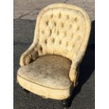 A Victorian button upholstered spoonback nursing chair with brocade upholstery and sprung seat,