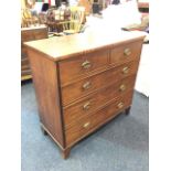 A nineteenth century mahogany chest of drawers, the rectangular top above two short and three long