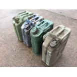 Four miscellaneous 20lt jerry cans, the earliest dated 1953. (18.5in) (4)