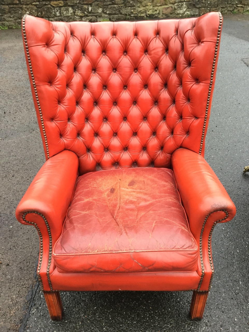 A Georgian style leather button upholstered wingback armchair, with brass studding and loose - Image 2 of 3