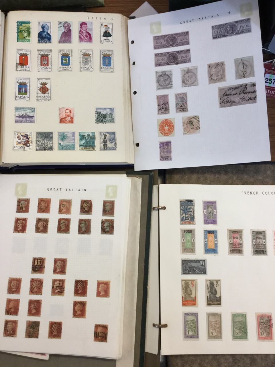 A stamp collection contained in three albums, GB and the world, some unused loose leaves for Stanley