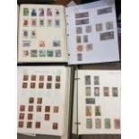 A stamp collection contained in three albums, GB and the world, some unused loose leaves for Stanley