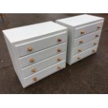 A pair of modern painted chests, each with four knobbed drawers. (27in x 17in x 25.5in) (2)
