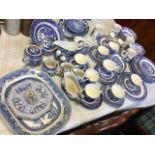 Miscellaneous willow pattern ceramics including a nineteenth century ashet, a teaset, Woods, mugs,