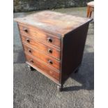 A nineteenth century mahogany commode, the rectangular reeded top rising above a fitted interior,