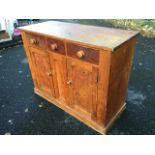 A nineteenth century pine & mahogany Scotch dresser, the rectangular top above three knobbed