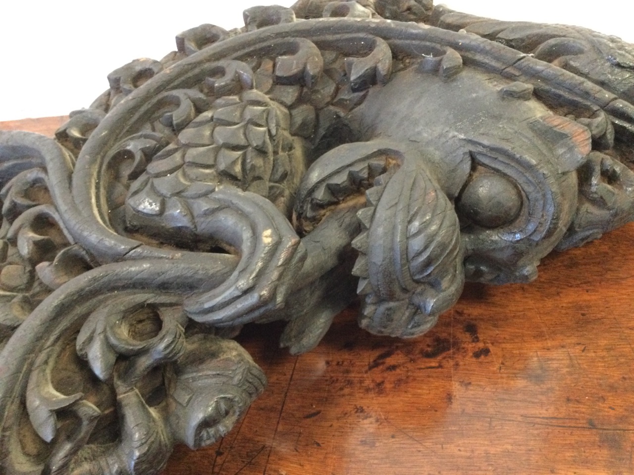 An antique eastern carving from a building, the stylised clawed dragon with foliage, encrusted - Image 2 of 3