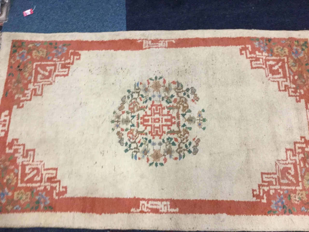 A Chinese style wool rug woven with circular floral medallion on fawn ground, the salmon pink border - Image 2 of 3
