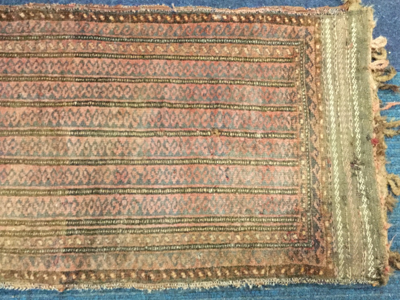 A nineteenth century kelim cushion cover, woven with three bands of hooked square medallions - Image 2 of 3