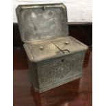 A nineteenth century pewter tea caddy, the rectangular box with canted corners decorated with