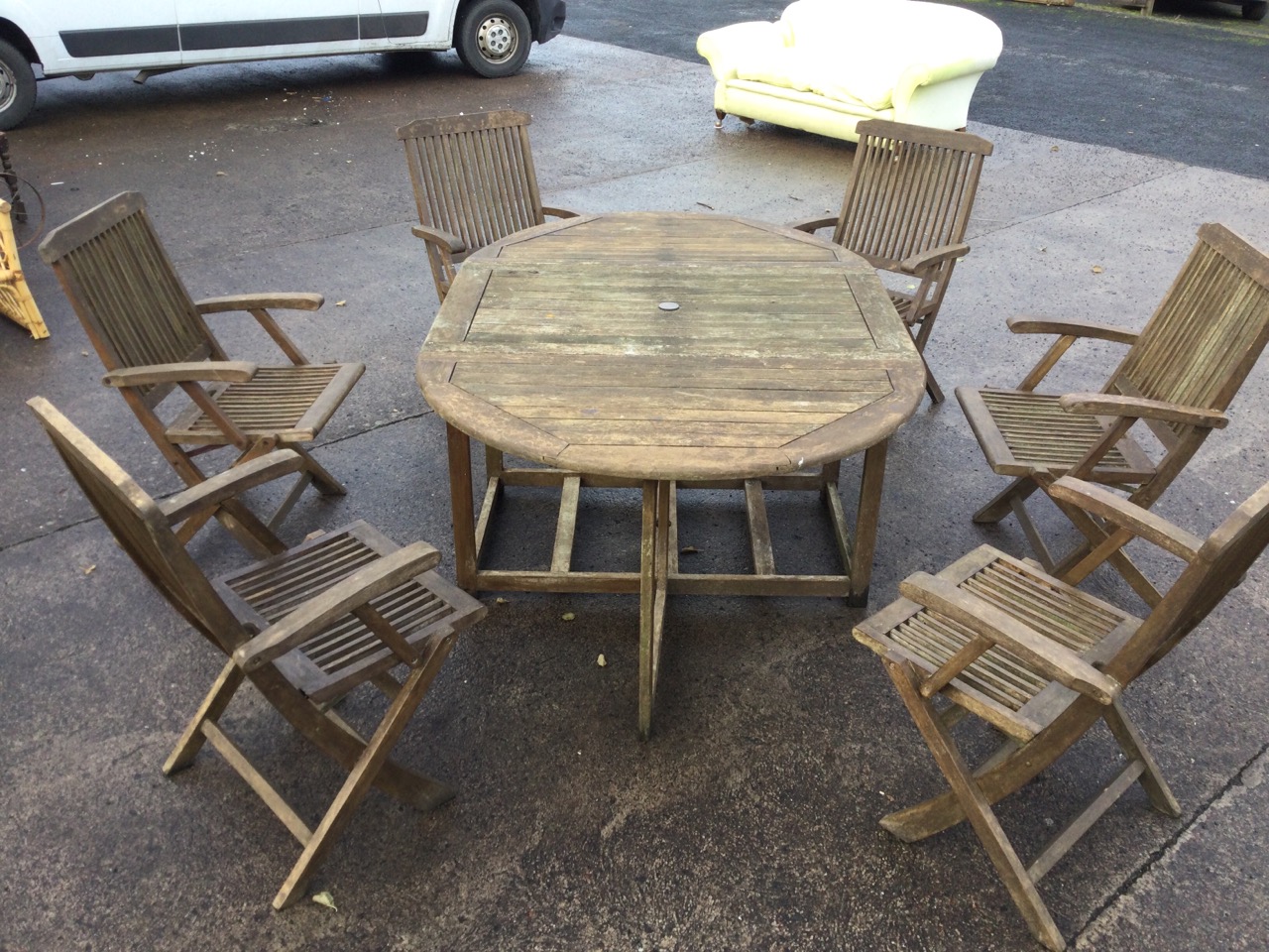 A teak garden suite, the oval slatted table with drop leaves on rectangular frame, the six folding - Image 3 of 3