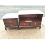 A mahogany Stag bedside cabinet with slide above two drawers mounted with ring handles; and a Stag