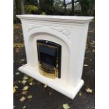A contemporary painted chimneypiece, the mantelpiece with dentil cornice above vine moulded