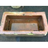 A rectangular Victorian salt glazed stoneware trough with flat moulded rim. (35.5in)
