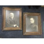 A pair of oak framed late nineteenth century family portraits of a lady and gentleman, the plates