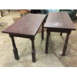 A pair of rectangular oak tables with plain aprons raised on baluster turned tapering legs with
