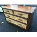 A late Victorian walnut chest, the rectangular moulded top above two short and two long drawers